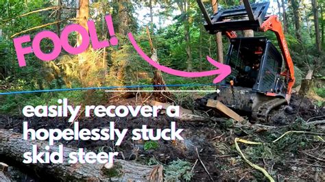 how to get a skid steer out of mud|how to unstuck a skid steer.